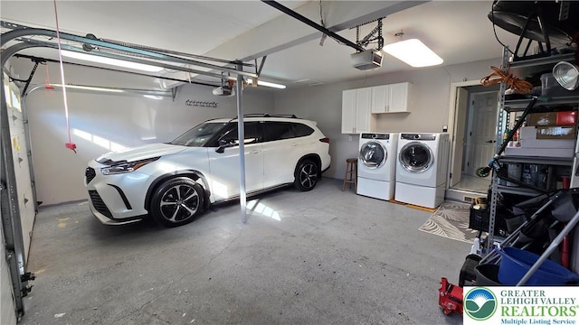 1136 Ashbourne Dr, Muhlenberg Twp, PA 19605 - garage with washing machine and dryer and a garage door opener
