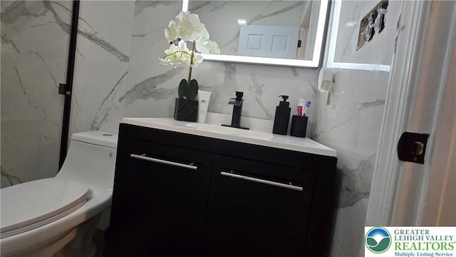 1136 Ashbourne Dr, Muhlenberg Twp, PA 19605 - bathroom with vanity and toilet