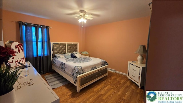 1136 Ashbourne Dr, Muhlenberg Twp, PA 19605 - bedroom with wood finished floors and ceiling fan