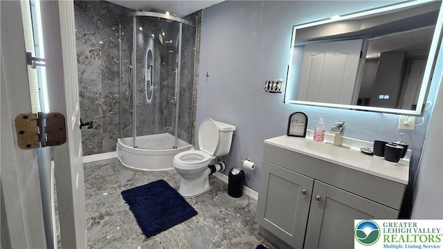 1136 Ashbourne Dr, Muhlenberg Twp, PA 19605 - bathroom featuring marble finish floors, a stall shower, and vanity