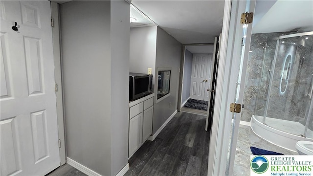 1136 Ashbourne Dr, Muhlenberg Twp, PA 19605 - full bath featuring a marble finish shower and wood finished floors