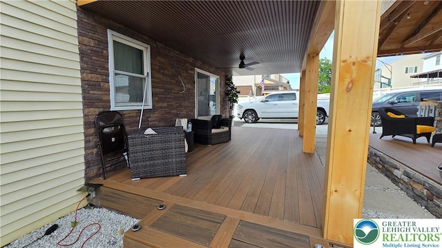 1136 Ashbourne Dr, Muhlenberg Twp, PA 19605 - deck with ceiling fan
