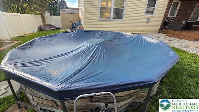 1136 Ashbourne Dr, Muhlenberg Twp, PA 19605 - view of swimming pool featuring a wooden deck