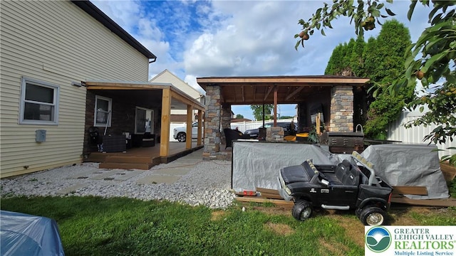 1136 Ashbourne Dr, Muhlenberg Twp, PA 19605 - view of patio / terrace with a deck