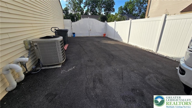 1136 Ashbourne Dr, Muhlenberg Twp, PA 19605 - view of patio / terrace featuring a gate