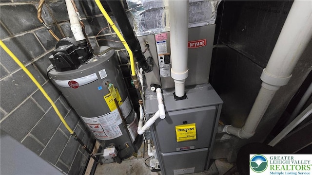 1136 Ashbourne Dr, Muhlenberg Twp, PA 19605 - utility room featuring water heater