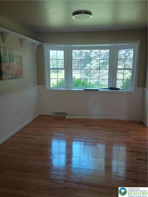 6059 Clubhouse Ln, Lower Macungie Twp, PA 18106 - spare room with wood finished floors and baseboards