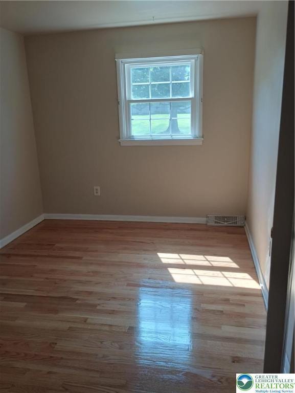 6059 Clubhouse Ln, Lower Macungie Twp, PA 18106 - unfurnished room featuring wood finished floors and baseboards