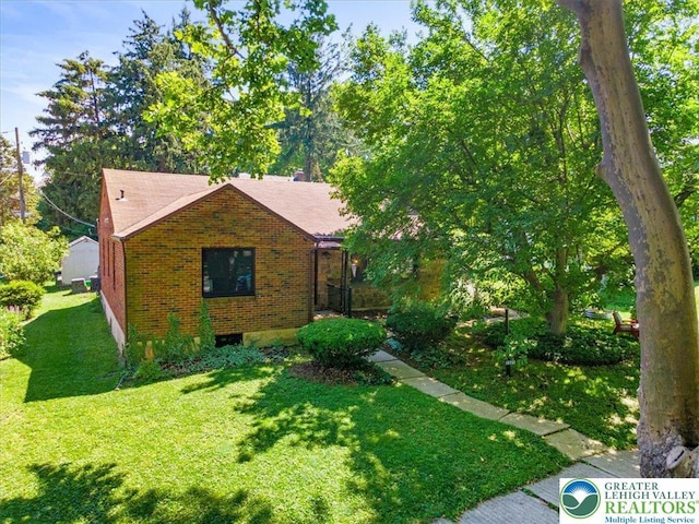 1321 W Union Blvd, Bethlehem City, PA 18018 - view of front of property featuring brick siding, a front yard, and a shingled roof