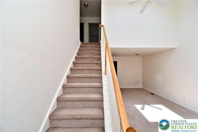 5631 Stonecroft Ln, Lower Macungie Twp, PA 18106 - stairs featuring carpet flooring and a ceiling fan