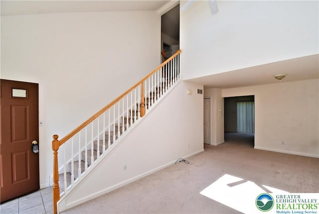 5631 Stonecroft Ln, Lower Macungie Twp, PA 18106 - stairs with a high ceiling and carpet