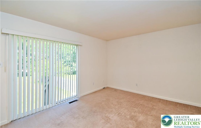 5631 Stonecroft Ln, Lower Macungie Twp, PA 18106 - carpeted empty room featuring baseboards