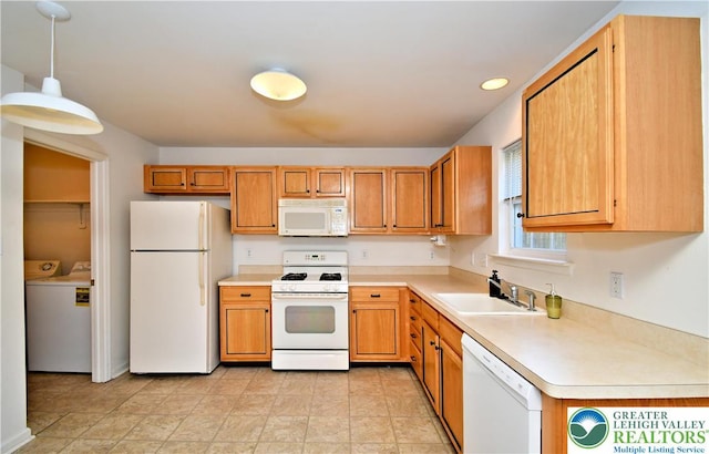 5631 Stonecroft Ln, Lower Macungie Twp, PA 18106 - kitchen with white appliances, light countertops, decorative light fixtures, recessed lighting, and washing machine and dryer