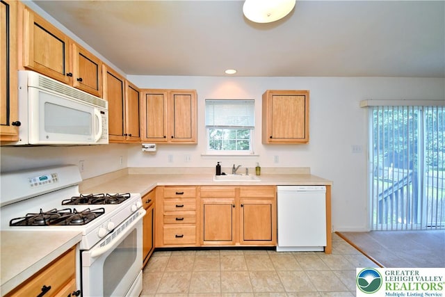 5631 Stonecroft Ln, Lower Macungie Twp, PA 18106 - kitchen featuring white appliances, light countertops, recessed lighting, and light tile patterned floors