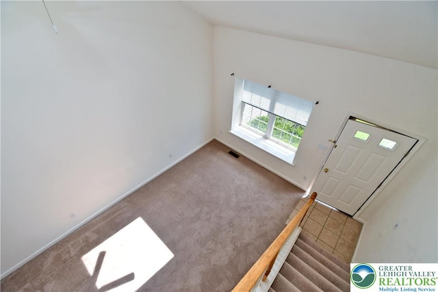 5631 Stonecroft Ln, Lower Macungie Twp, PA 18106 - carpeted foyer with baseboards and stairs