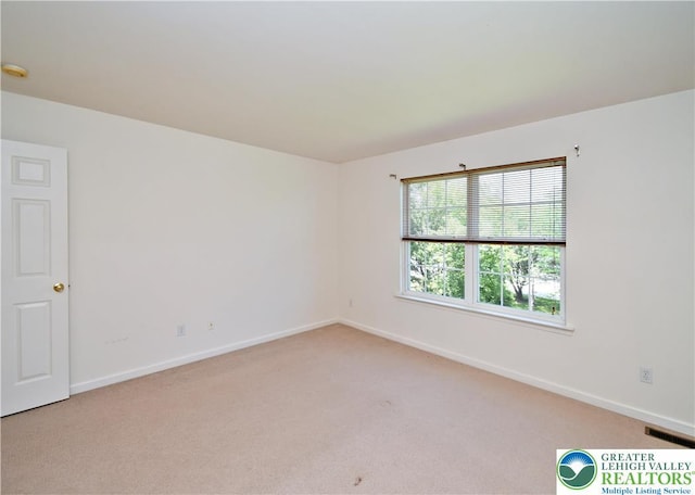 5631 Stonecroft Ln, Lower Macungie Twp, PA 18106 - empty room with light colored carpet and baseboards