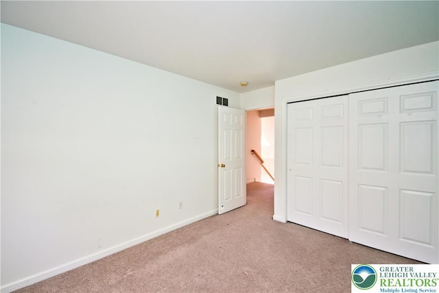 5631 Stonecroft Ln, Lower Macungie Twp, PA 18106 - unfurnished bedroom with carpet and a closet