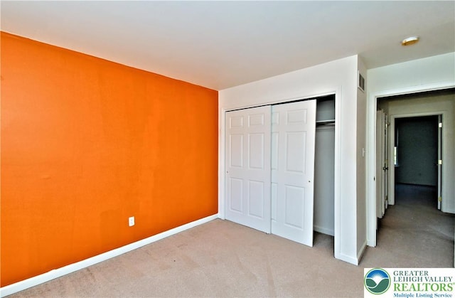 5631 Stonecroft Ln, Lower Macungie Twp, PA 18106 - unfurnished bedroom with carpet and a closet