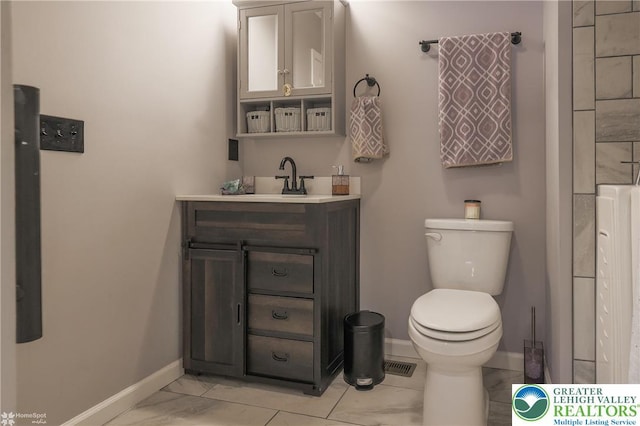 3536 New Hampshire Ave, Bethlehem Twp, PA 18045 - bathroom with baseboards and vanity