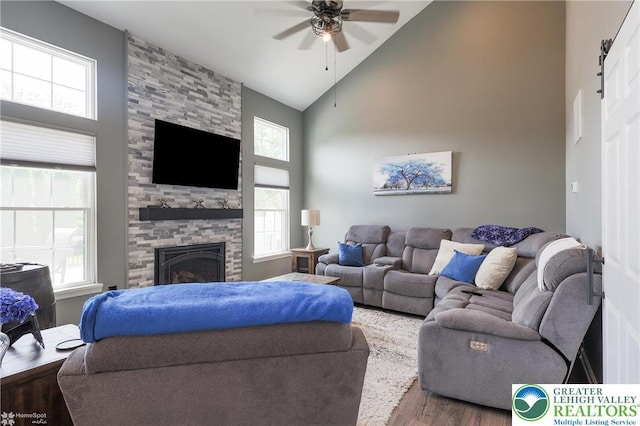 3536 New Hampshire Ave, Bethlehem Twp, PA 18045 - living room featuring a ceiling fan, high vaulted ceiling, wood finished floors, and a fireplace