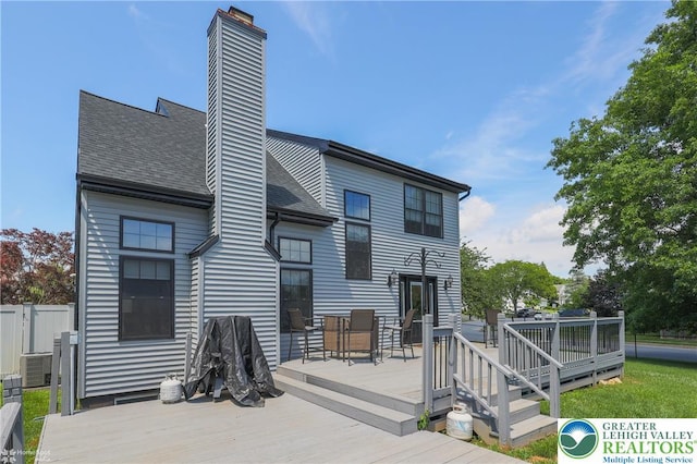 3536 New Hampshire Ave, Bethlehem Twp, PA 18045 - rear view of property with a wooden deck, a chimney, and a shingled roof