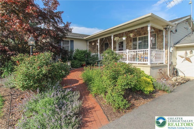 518 Bauer Rd, Moore Twp, PA 18014 - ranch-style home featuring covered porch and stone siding