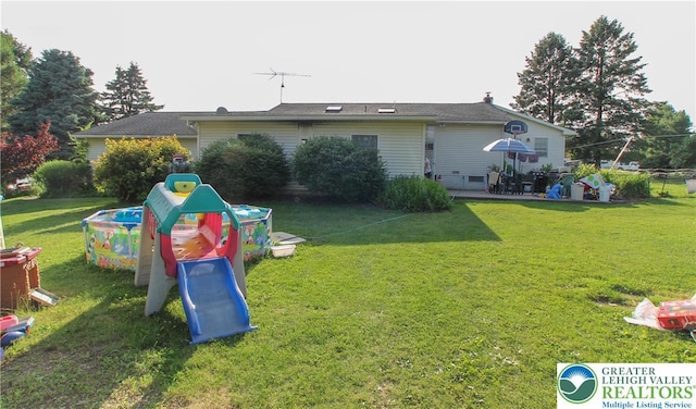 518 Bauer Rd, Moore Twp, PA 18014 - back of house featuring a yard and a patio