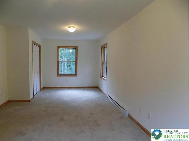217 St Andrews Dr, Middle Smithfield Twp, PA 18324 - spare room featuring baseboard heating and light carpet