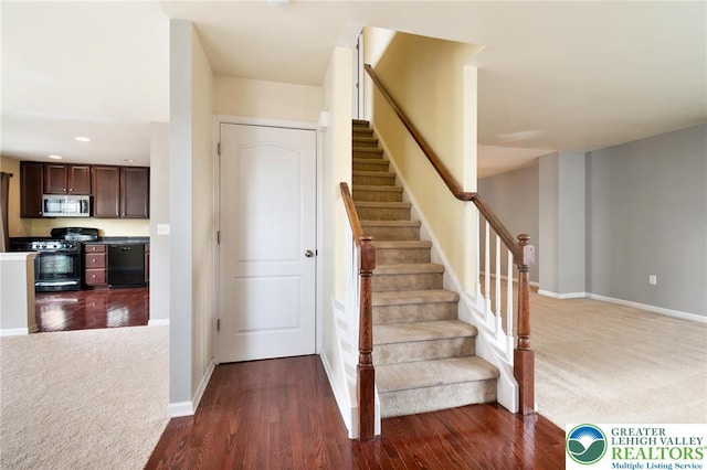 4094 Bunker Hill Dr S, Upper Saucon Twp, PA 18036 - stairway featuring carpet flooring and wood finished floors