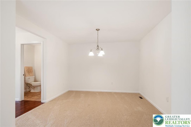 4094 Bunker Hill Dr S, Upper Saucon Twp, PA 18036 - carpeted spare room with a chandelier and baseboards