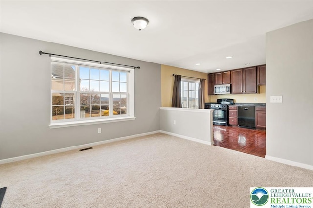 4094 Bunker Hill Dr S, Upper Saucon Twp, PA 18036 - unfurnished living room with dark carpet and recessed lighting
