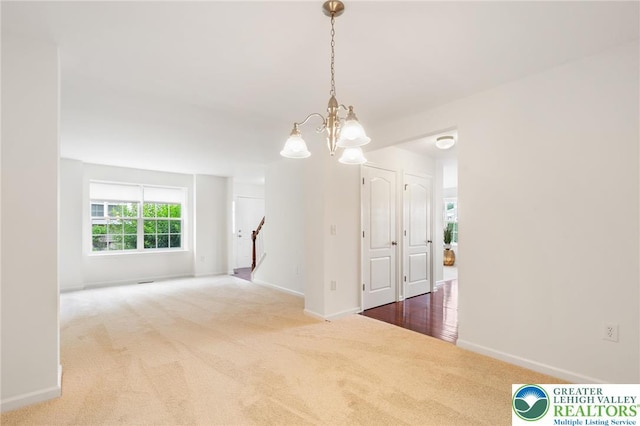 4094 Bunker Hill Dr S, Upper Saucon Twp, PA 18036 - carpeted spare room with a chandelier and baseboards