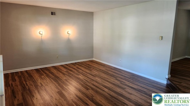 2425 Pennsylvania St, South Whitehall Twp, PA 18104 - empty room with baseboards and dark wood-style flooring