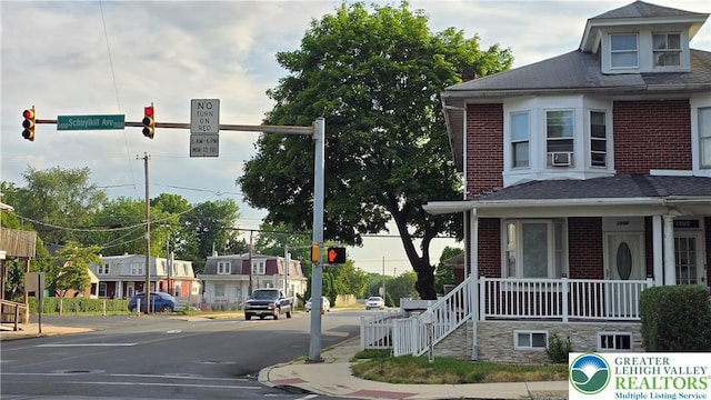1500 Schuylkill Ave, Reading City, PA 19601 - view of asphalt road featuring traffic lights, sidewalks, curbs, and traffic signs