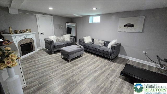 1500 Schuylkill Ave, Reading City, PA 19601 - living area with wood finished floors, recessed lighting, and a fireplace