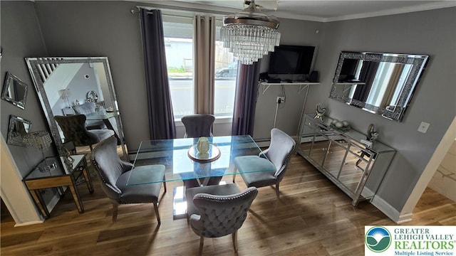 1500 Schuylkill Ave, Reading City, PA 19601 - dining room featuring wood finished floors, a chandelier, and ornamental molding