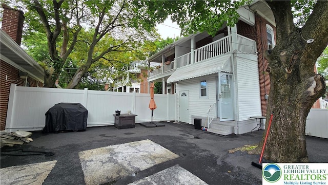 1500 Schuylkill Ave, Reading City, PA 19601 - back of house with entry steps, a patio area, and a balcony