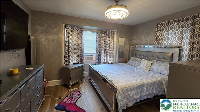 1500 Schuylkill Ave, Reading City, PA 19601 - bedroom featuring dark wood-type flooring and cooling unit