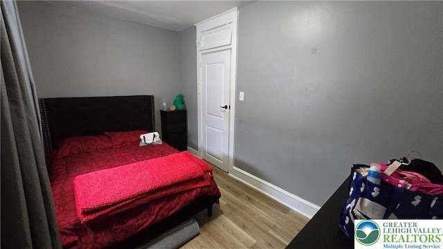 1500 Schuylkill Ave, Reading City, PA 19601 - bedroom with light wood-type flooring and baseboards