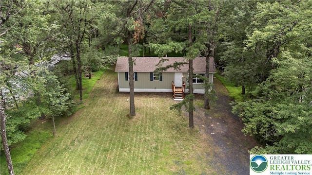29 Long Brook Way, Penn Forest Twp, PA 18210 - view of front of home with a shingled roof and a forest view