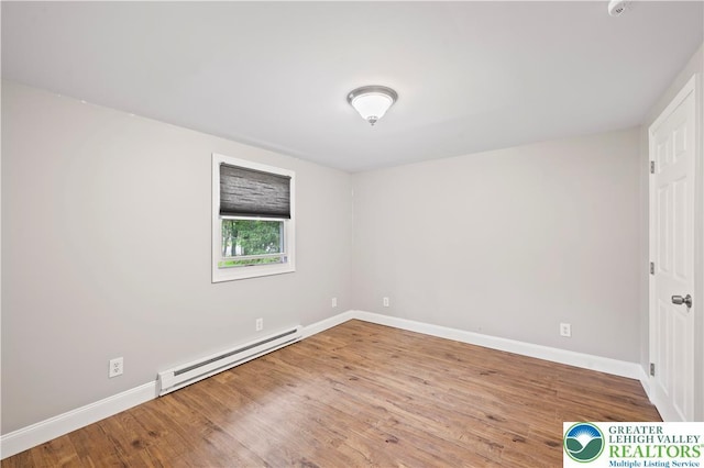 29 Long Brook Way, Penn Forest Twp, PA 18210 - unfurnished bedroom with baseboard heating and wood finished floors
