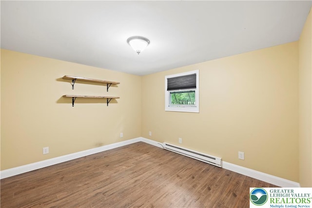 29 Long Brook Way, Penn Forest Twp, PA 18210 - spare room featuring a baseboard radiator and wood finished floors