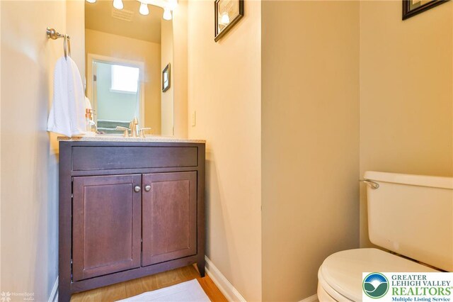 1945 Jenkins Dr, Forks Twp, PA 18040 - half bath with vanity and wood finished floors
