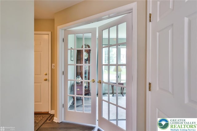 1945 Jenkins Dr, Forks Twp, PA 18040 - doorway to outside with french doors and dark wood-style flooring