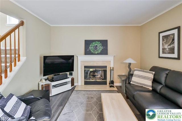 1945 Jenkins Dr, Forks Twp, PA 18040 - living area with stairs, ornamental molding, a glass covered fireplace, and dark wood-style floors
