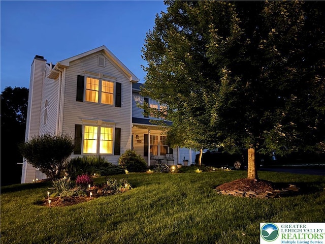 1945 Jenkins Dr, Forks Twp, PA 18040 - traditional home featuring a chimney and a front yard