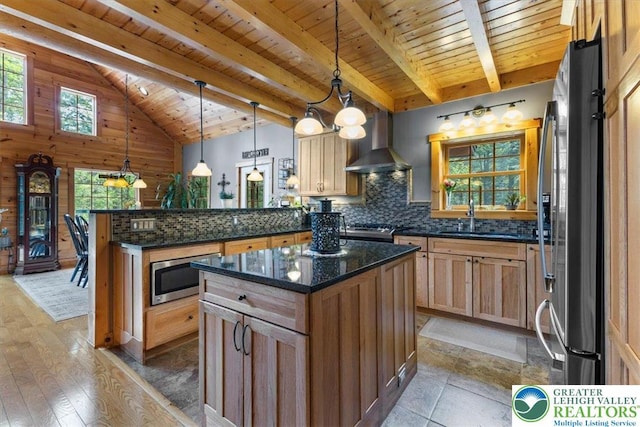 207 W Douglasville Rd, Bushkill Twp, PA 18064 - kitchen featuring wall chimney exhaust hood, appliances with stainless steel finishes, a peninsula, a wooden ceiling with exposed beams, and tasteful backsplash