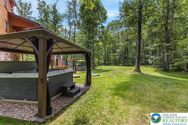 207 W Douglasville Rd, Bushkill Twp, PA 18064 - view of grassy yard featuring a hot tub