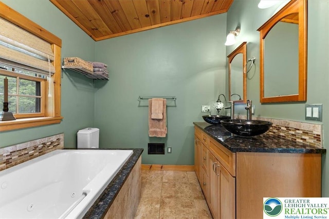 207 W Douglasville Rd, Bushkill Twp, PA 18064 - full bathroom with vanity, a tub with jets, and wooden ceiling