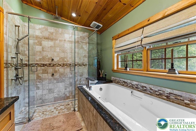 207 W Douglasville Rd, Bushkill Twp, PA 18064 - bathroom with wooden ceiling, a jetted tub, a shower stall, lofted ceiling, and plenty of natural light